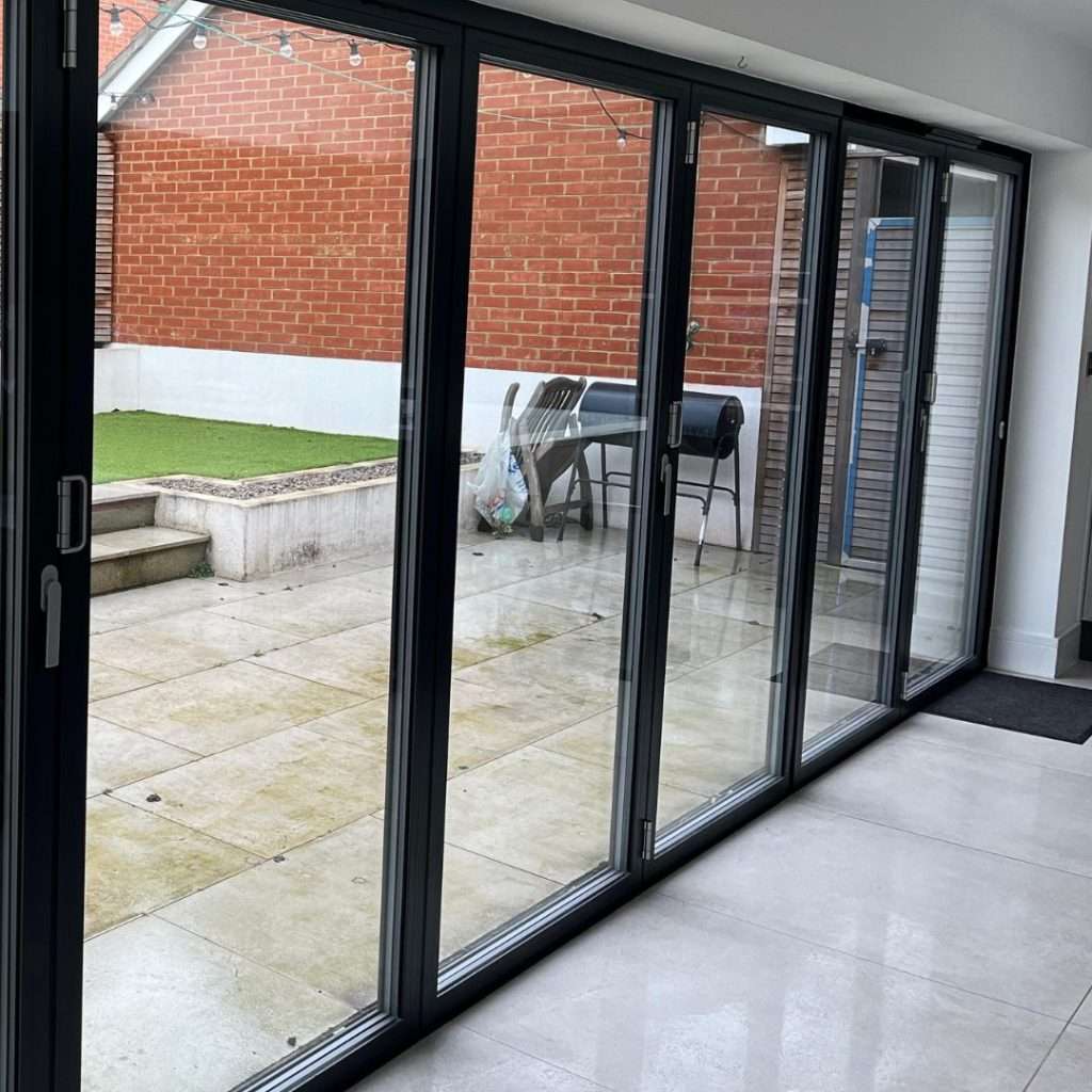 Security window film applied to a large set of bifold doors in Essex to strengthen the glass and enhance safety