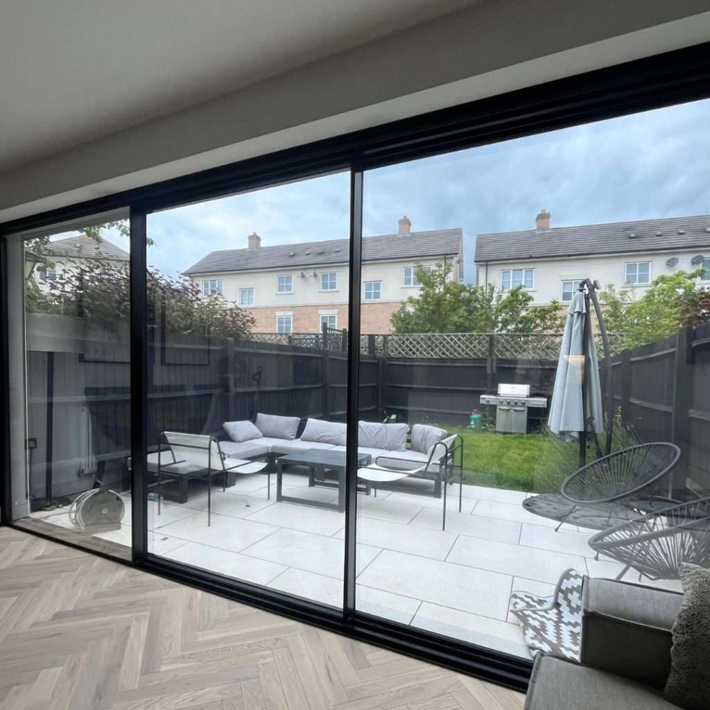 Security window film applied to bifold doors to strengthen the glass and improve safety