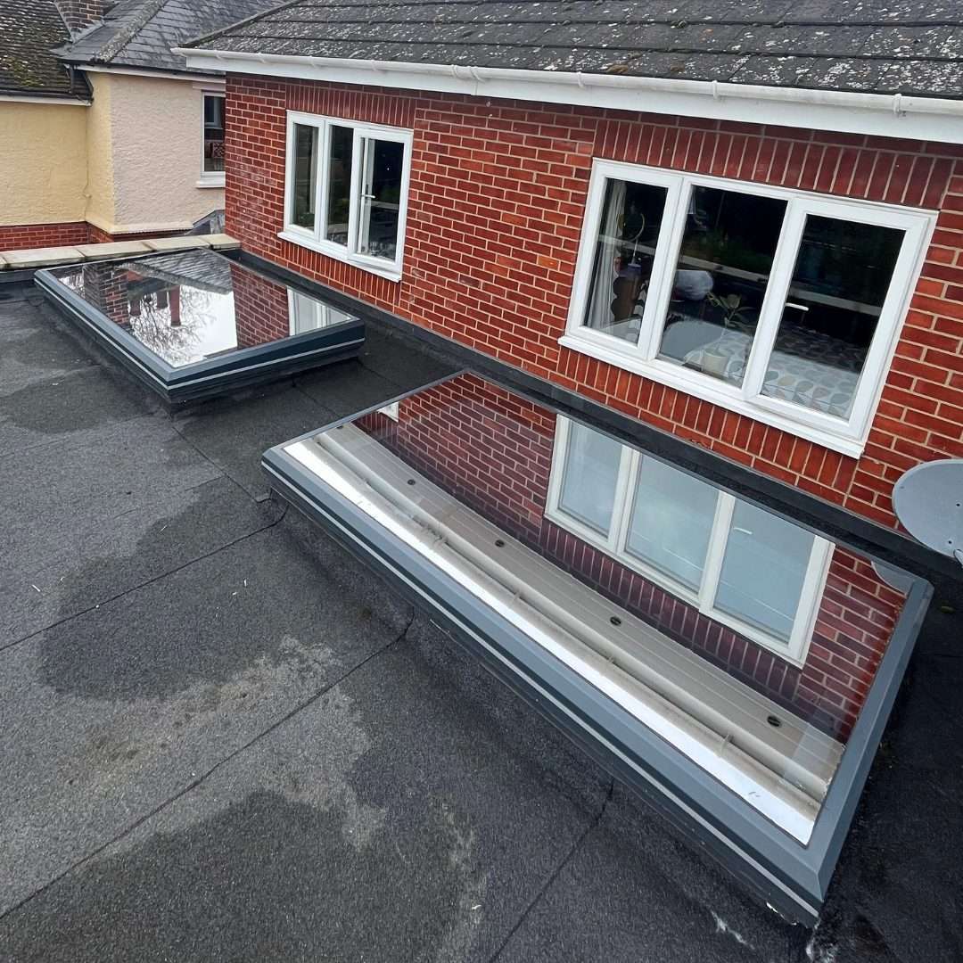 Solar control window film applied to two skylights for UV protection, temperature control, and glare reduction