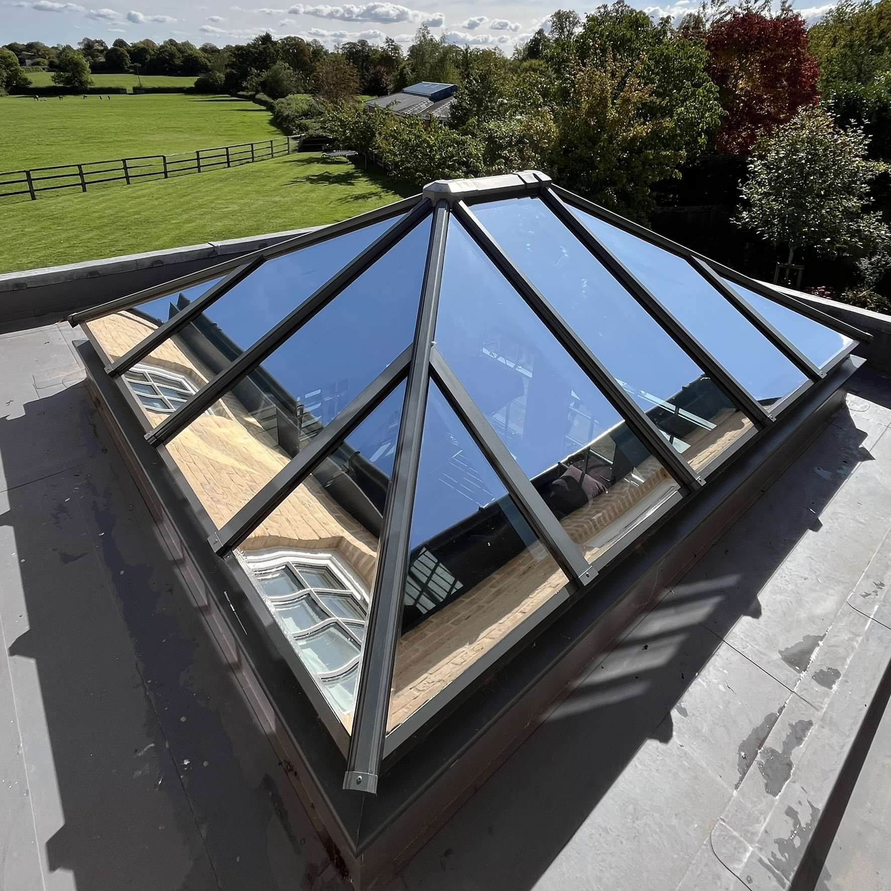 External view of a roof skylight in Cambridge fitted with Silver 20 reflective solar window film, reducing heat gain and limiting UV rays entering the home.