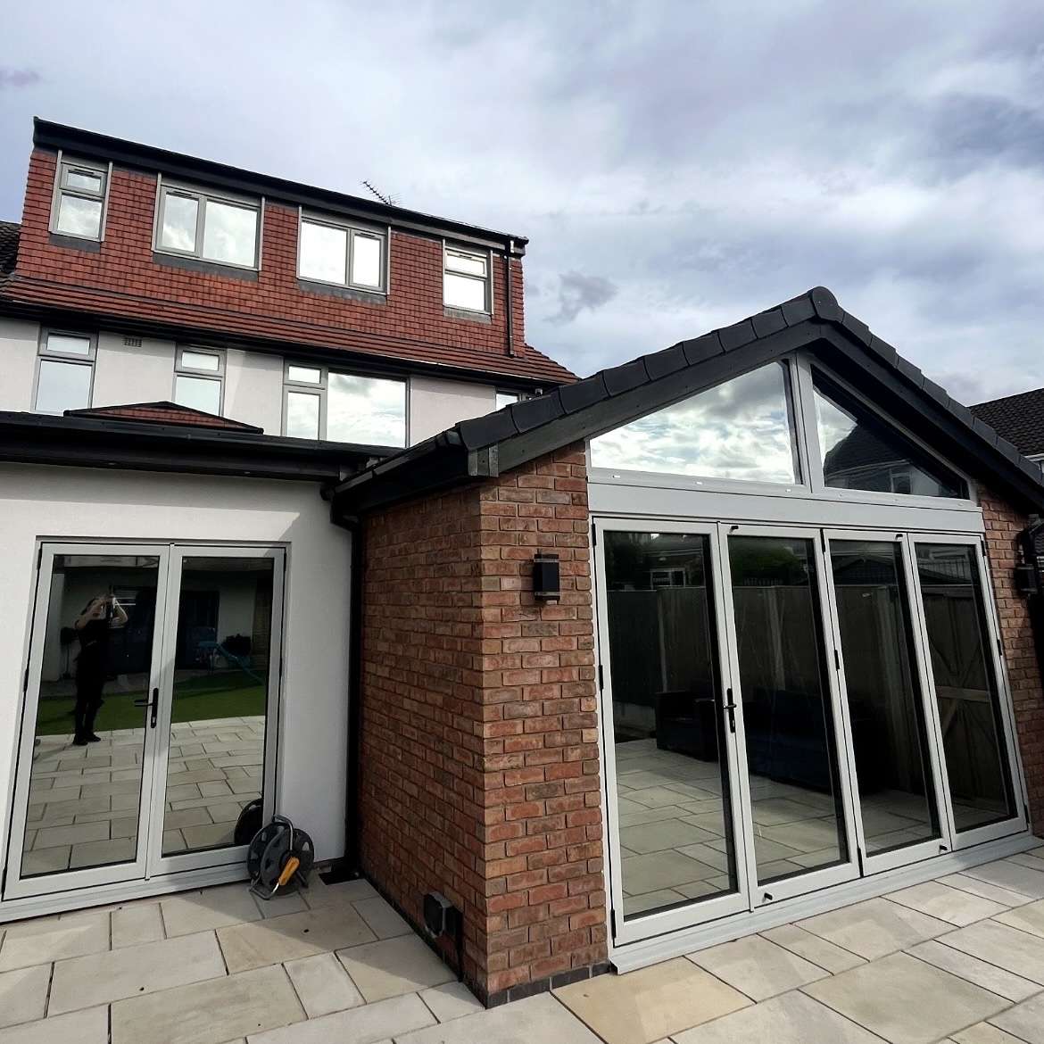 External rear view of a residential property in Northampton fitted with Silver 20 reflective solar window film, improving daytime privacy while helping control solar heat.
