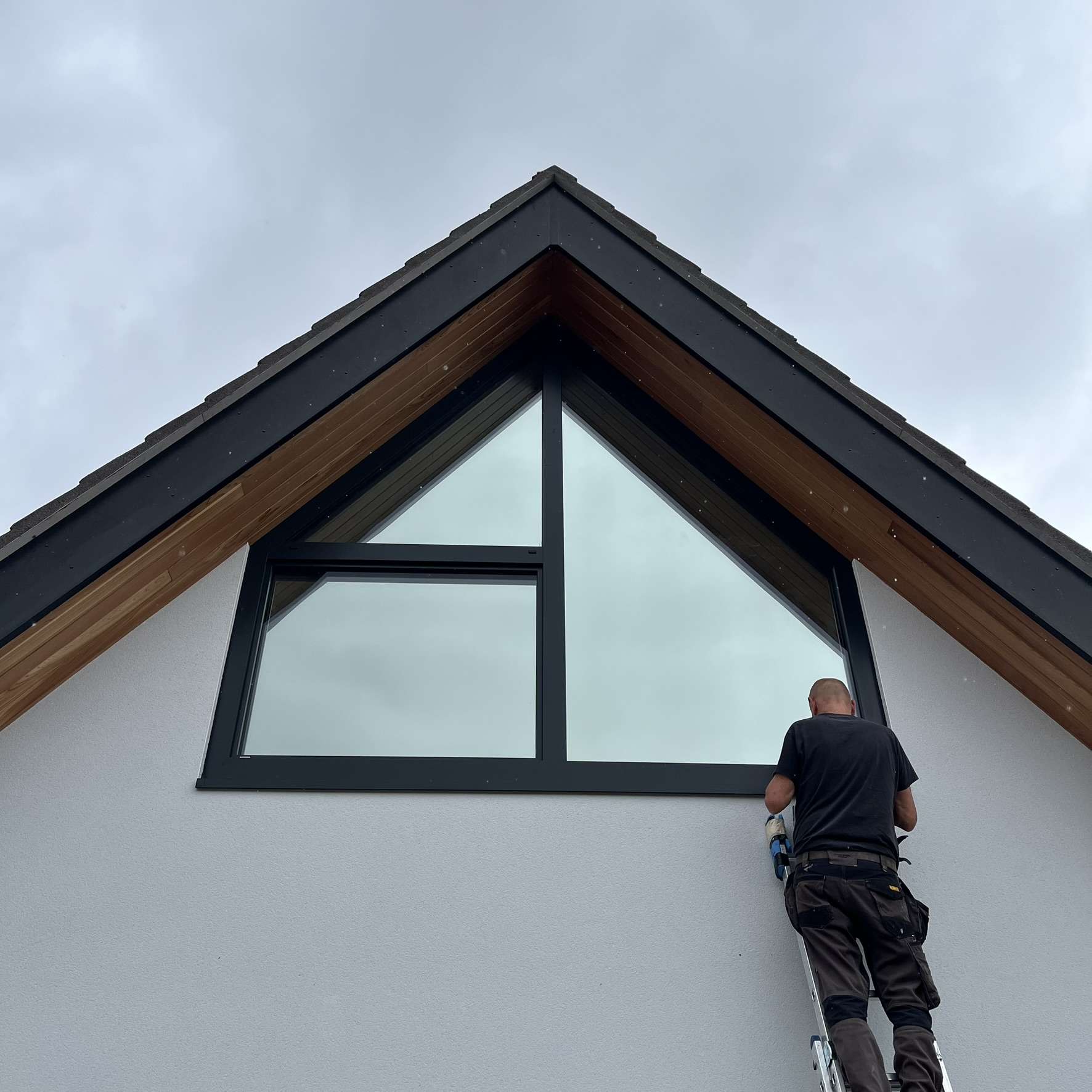 Silver 20 reflective solar film applied to the upper bathroom window of a house in Stretton for daytime privacy.