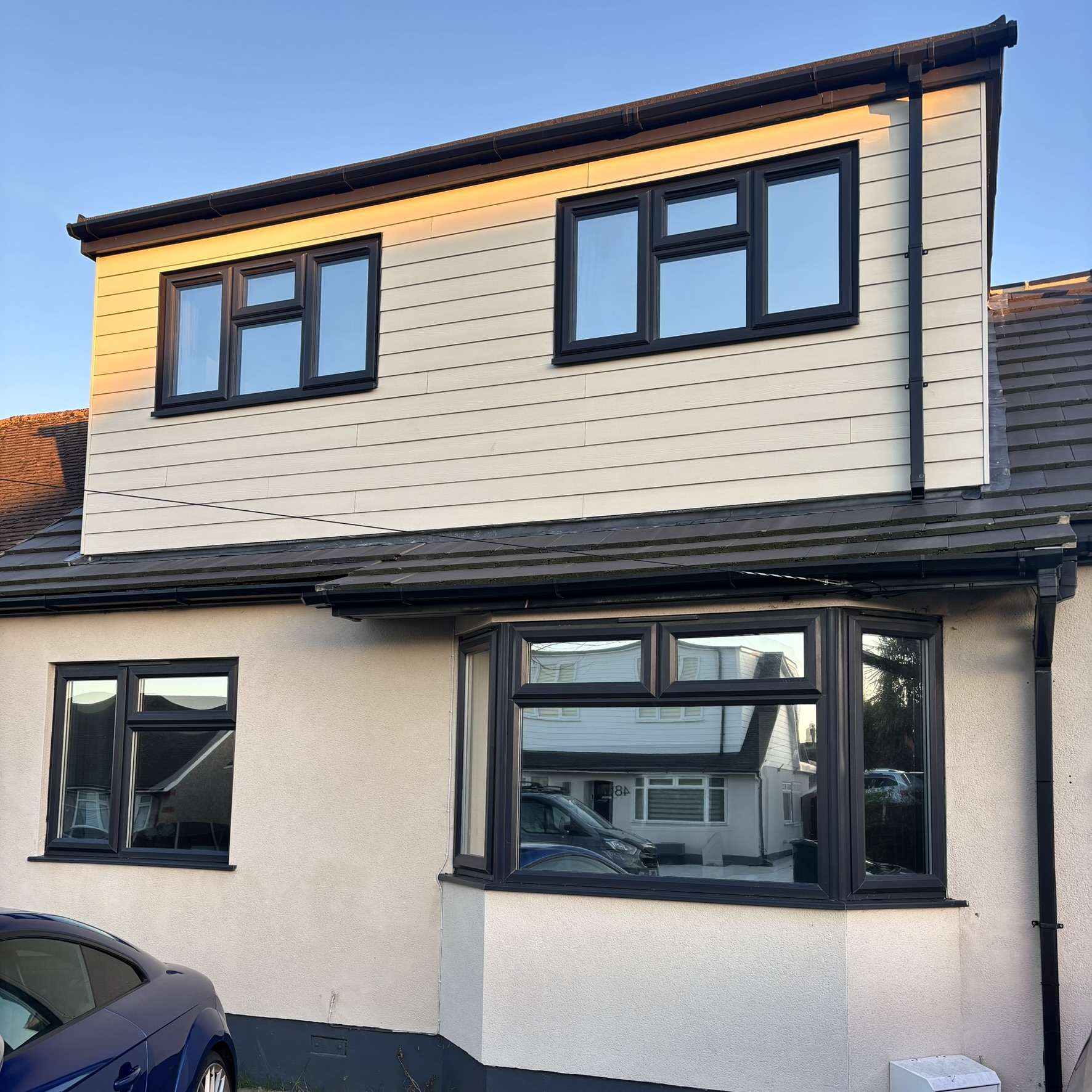 Silver 20 reflective solar film applied a house in Upminster for privacy from the street and heat control.