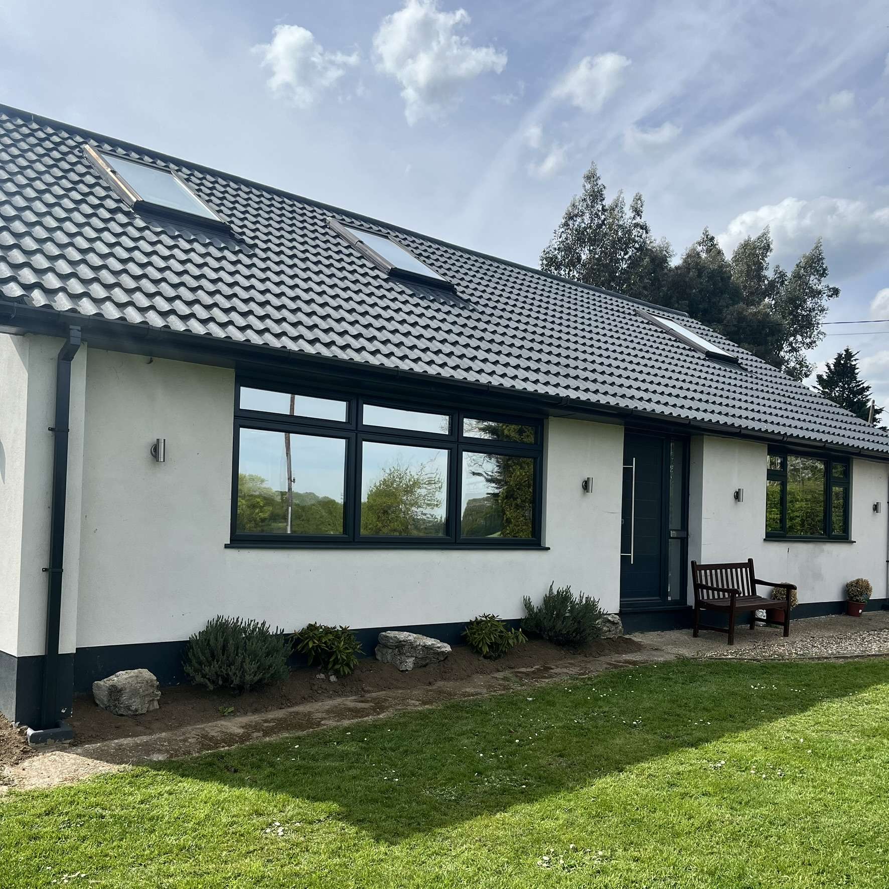 External front view of a bungalow in Wickford fitted with Silver 20 reflective solar window film, providing privacy from passersby and helping reject solar heat.