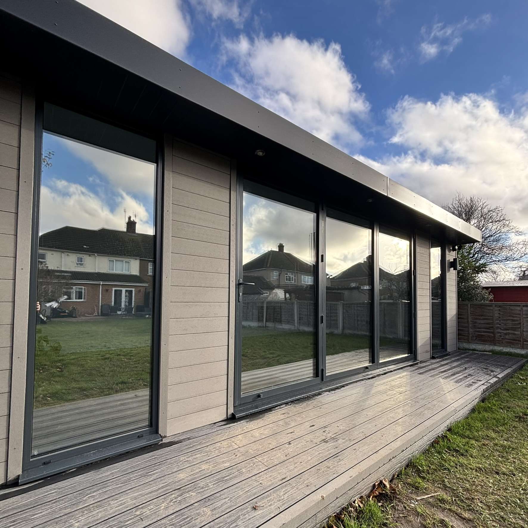 Silver 35 reflective solar film applied to a cabin in Grays for subtle privacy from neighbours and UV protection.