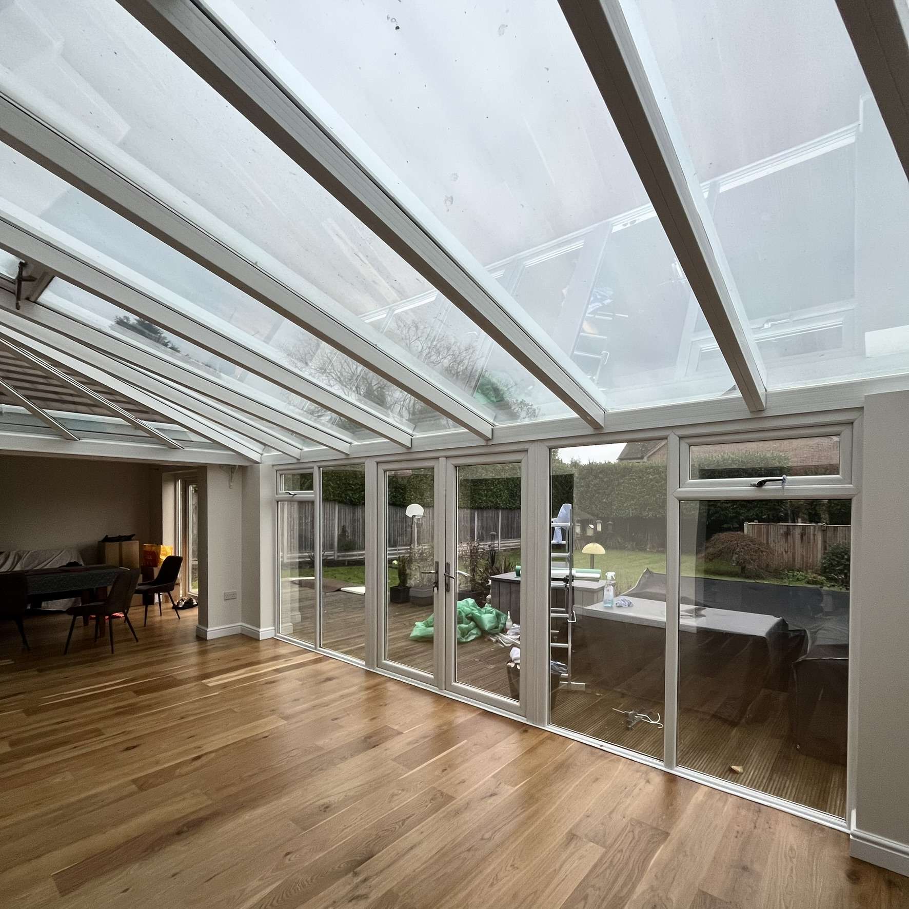 Inside view of Silver 35 reflective solar film installed on conservatory roof panes in High Wycombe to reduce heat build up and improve year round comfort.