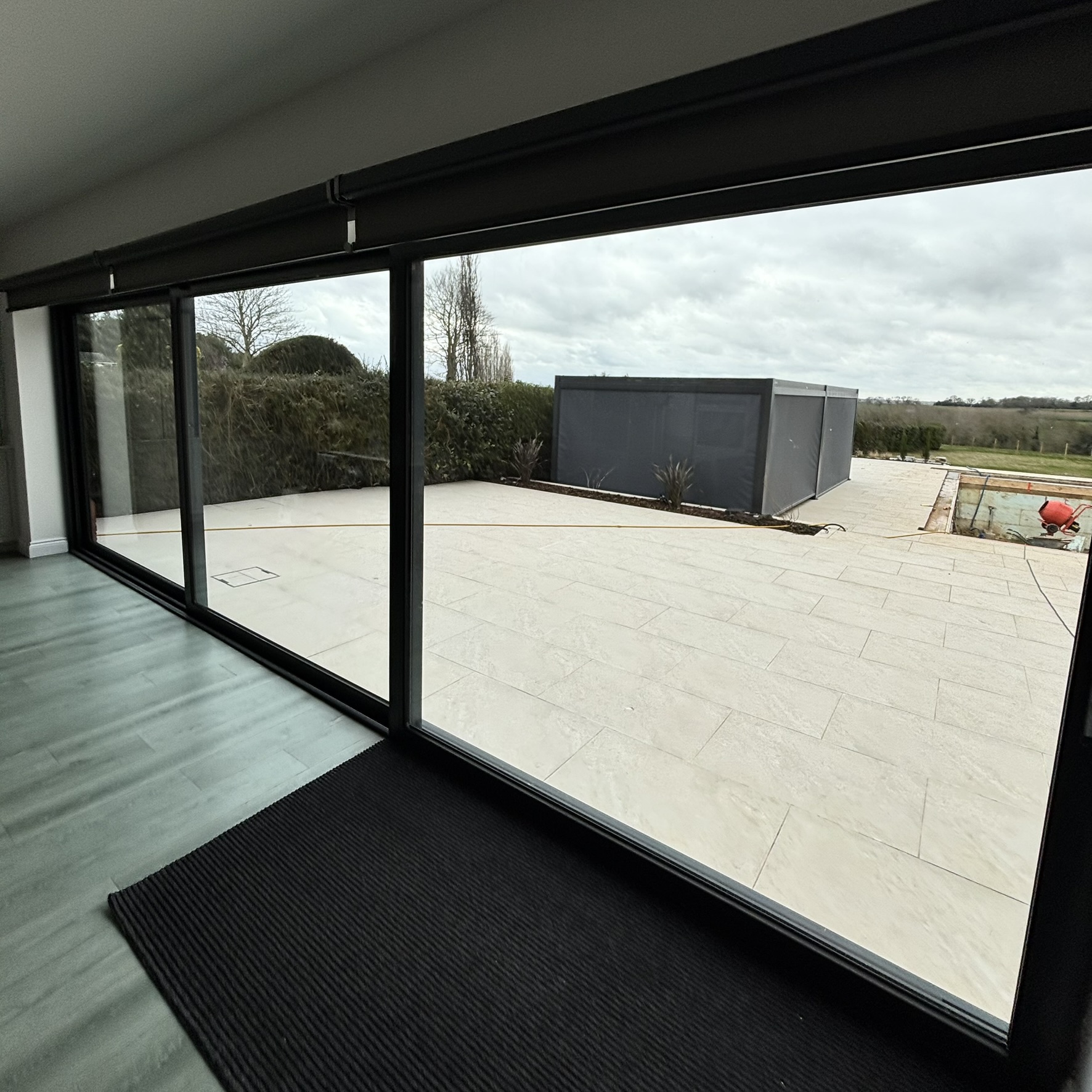 Interior view of sliding doors in a Northampton home fitted with specialist clear UV window film, protecting interiors from sun damage while maintaining a clear appearance.