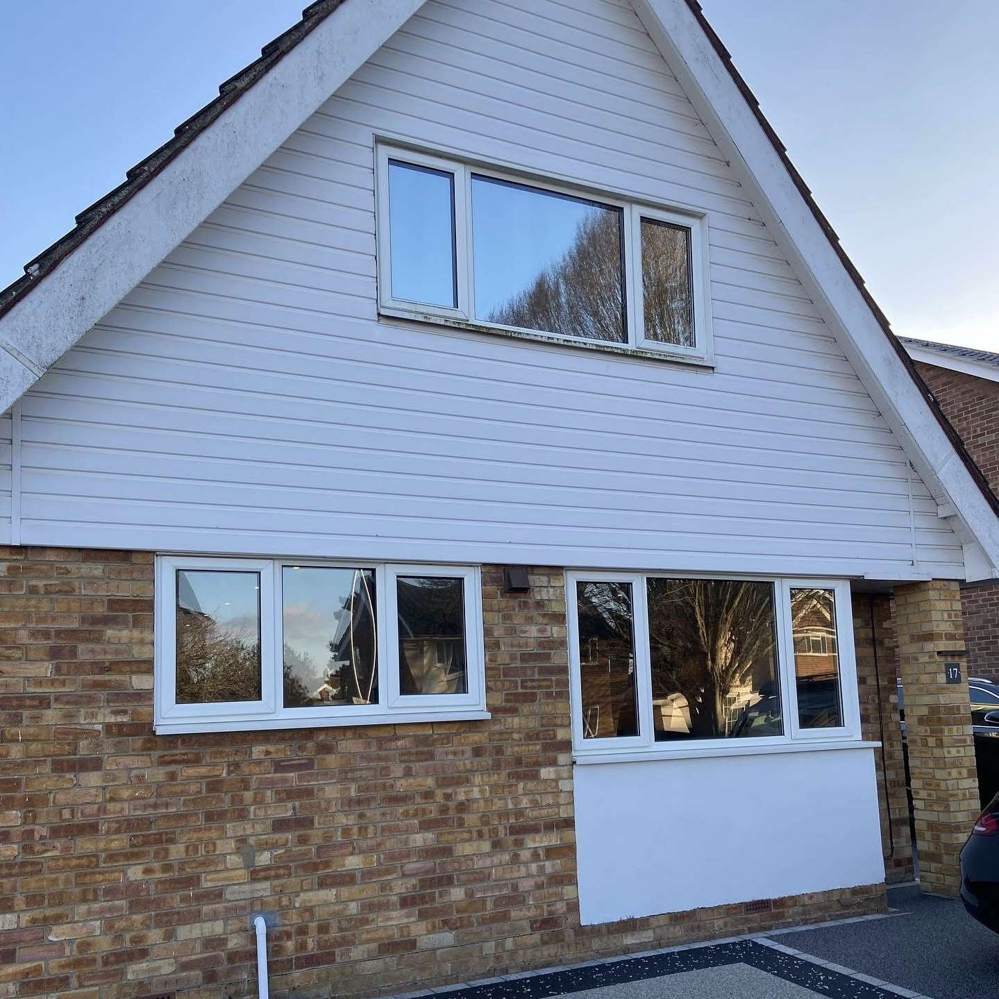 External front view of a residential property in Colchester fitted with Cool Grey 20 solar window film, offering subtle privacy, a sleek finish, and improved heat control.