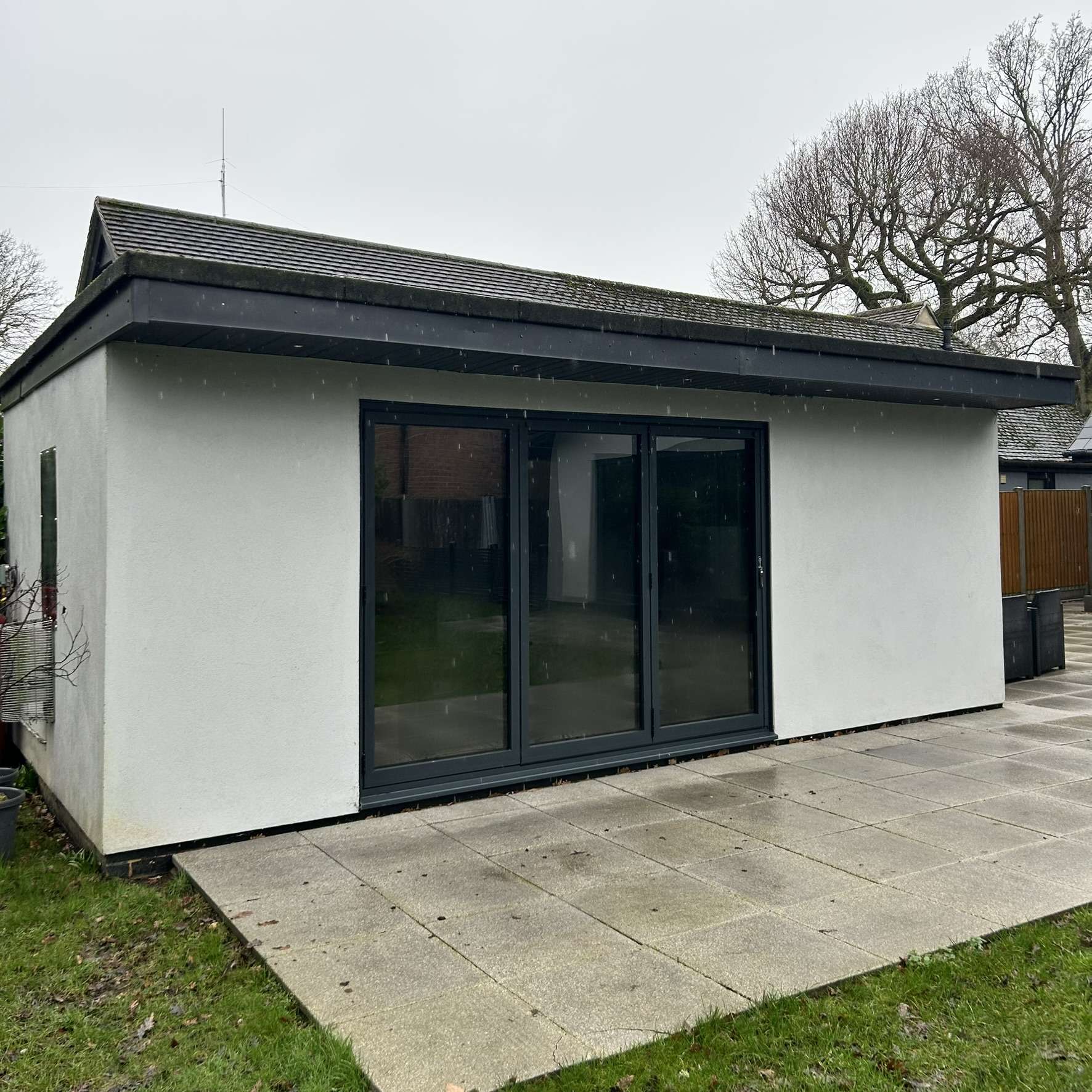 External view of bifold doors on a residential property in Colchester fitted with Dual Reflective 35 solar window film, providing subtle privacy with year-round solar control.