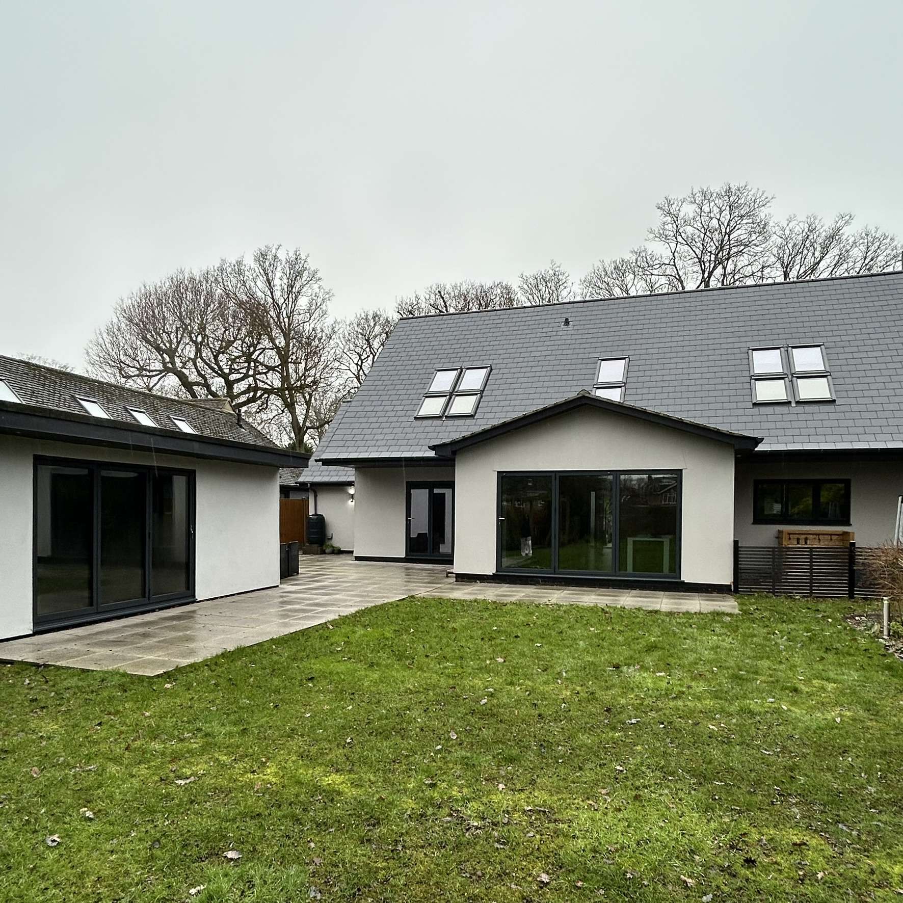 External rear view of a Colchester home fitted with Dual Reflective 35 solar window film, offering subtle privacy while reducing heat, glare, and UV exposure.