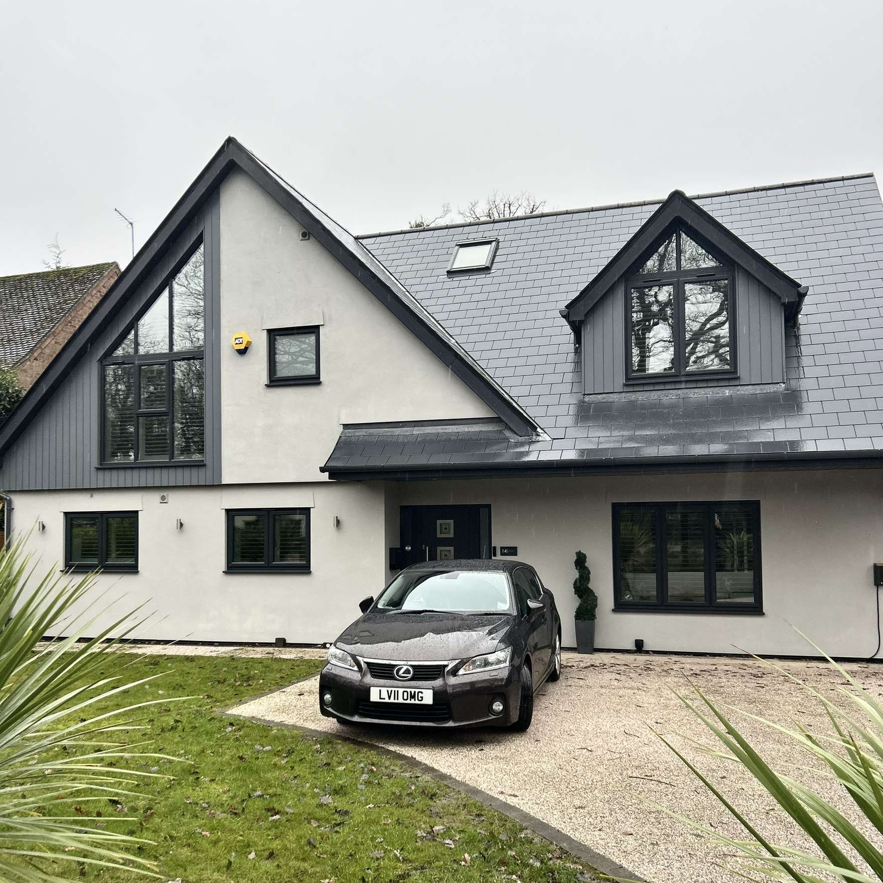 External front view of a residential property in Colchester with Dual Reflective 35 solar window film installed, delivering subtle privacy alongside heat and UV control.