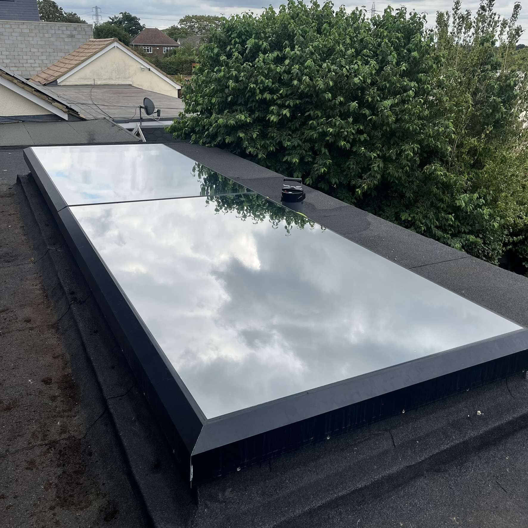 External view of a roof skylight in Grays fitted with Silver 20 reflective solar window film, reducing heat build-up, glare, and UV exposure.