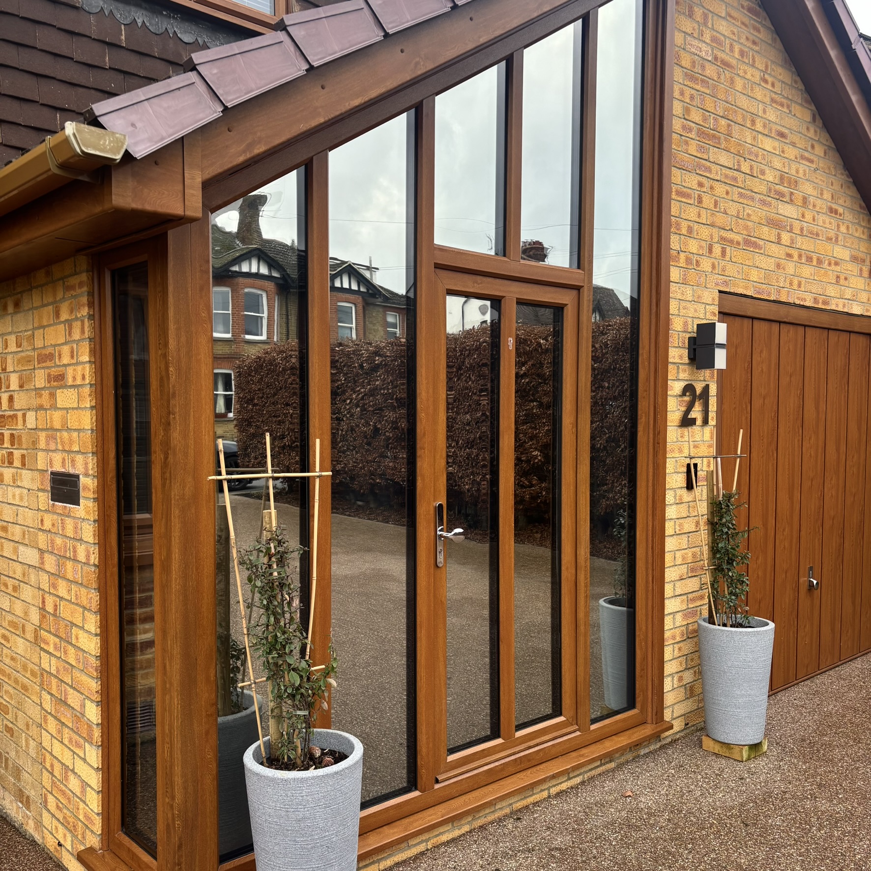 External view of a residential porch in Maidstone fitted with Silver 20 reflective solar window film, creating one-way daytime privacy from passers-by while helping protect the interior.