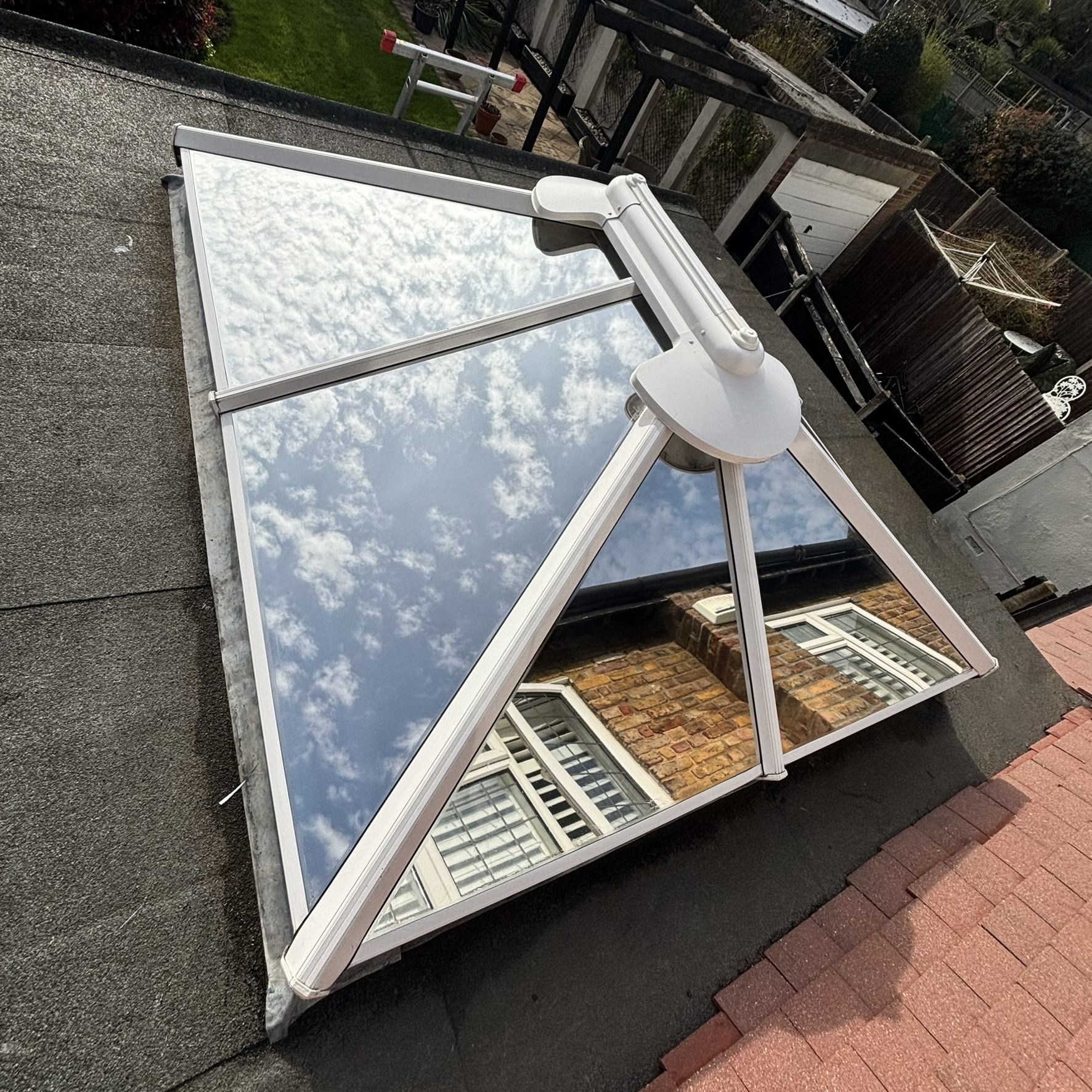 External view of a large skylight in Ruislip fitted with Silver 20 reflective solar window film, reducing glare while helping control heat and UV exposure year-round.